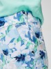 Spodnie damskie typu cygaretki w kwiaty