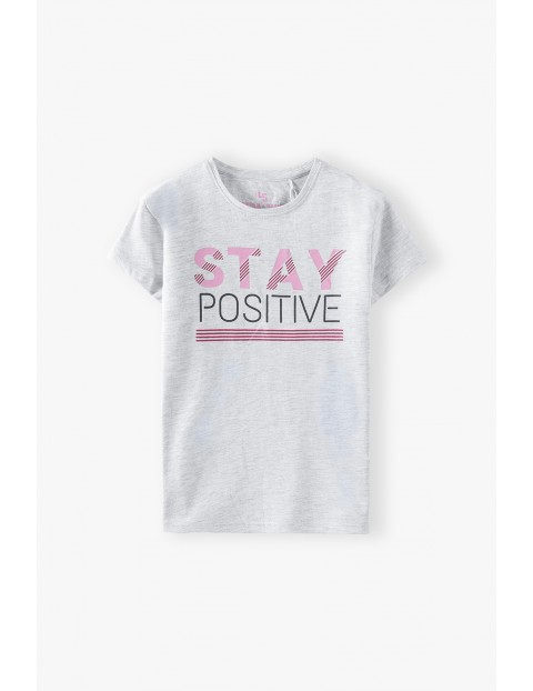 Beżowy t-shirt dziewczęcy z napisem Stay Positive