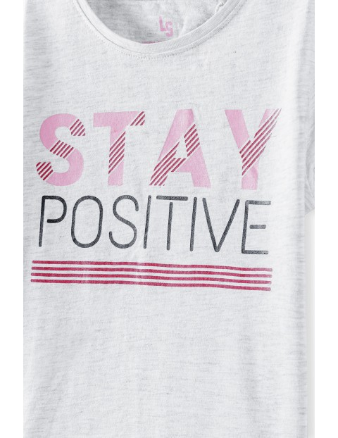 Beżowy t-shirt dziewczęcy z napisem Stay Positive