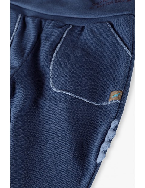 Spodnie dresowe niemowlęce ROSNĘ Z TOBĄ - niebieskie